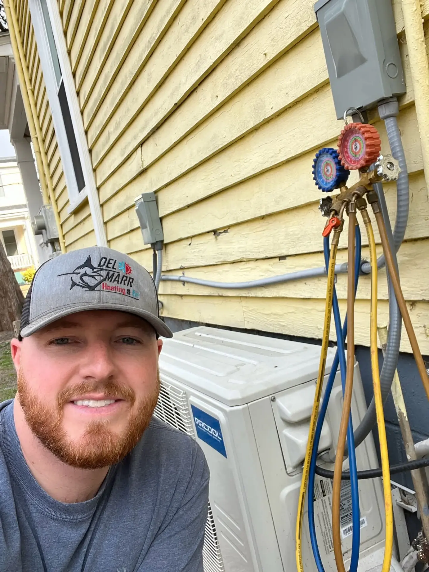 Aaron Marr servicing a residential mini split
